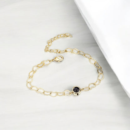 bracelet photo personnalisé femme couleur or avec des coeurs